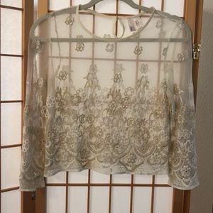 Sheer lace crop top with gold flower details🌼